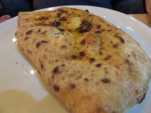 Ric's choice: a calzone with capers, olive, anchovies, spinach and ricotta. A bit salty for me, but he loved it.