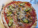 Pizza Zio Alfonso: zucchini, corn, peas, walnuts, mushrooms, prosciutto, tomato and mozzarella.